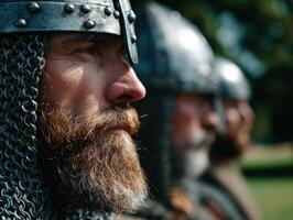Medieval reenactors in chainmail armor participate in historical event photo