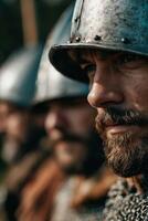 Medieval men in armor standing in a row photo