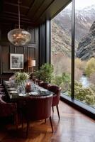 Elegant dining room with mountain view and river in the background photo