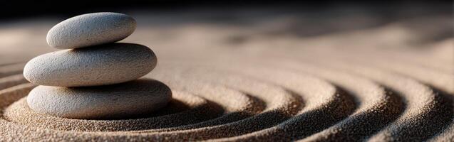 A stack of stones on top of sand photo
