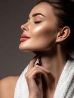 Model showcasing elegant skincare routine in a studio setting photo