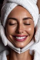 Woman enjoying a facial treatment in a spa with a serene expression photo