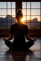 Mindful meditation at sunset in a serene indoor setting photo