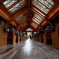 Ceremony taking place in a chapel with stunning stained glass windows photo