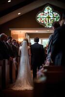 Bride and groom walk down the aisle in a beautiful indoor ceremony photo