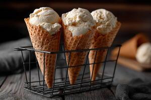 Three delicious ice cream cones served in a wire basket on a wooden table photo