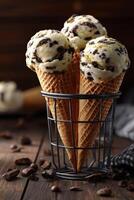Delicious ice cream cones with chocolate chunks in a rustic setting photo