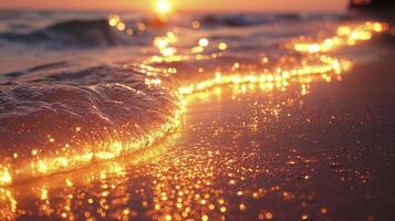 Sunset on the beach with waves and sparkling water photo
