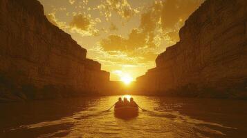 Two people in a canoe on a river at sunset photo
