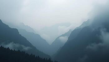 view of a mountain range in the fog photo