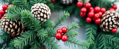 close up of a pine cone and red berries photo