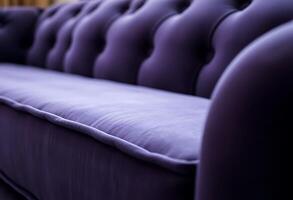 close up of a purple couch with buttons photo