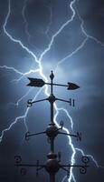 weather vane with lightning in the background photo