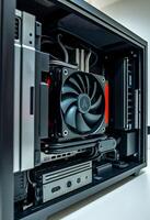 close up of a computer case with a fan photo