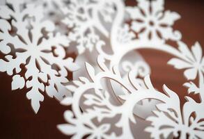 close up of a paper snowflake on a table photo
