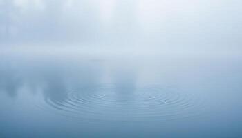 body of water surrounded by trees and fog photo