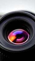 close up of a camera lens on a table photo