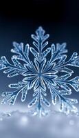 close up of a snowflake in the snow photo