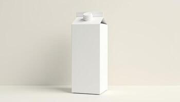 A white milk carton sitting on a table photo
