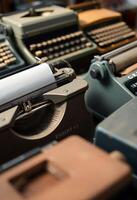 collection of old typewriters and typewriters photo