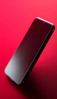 close up of a cell phone on a red surface photo