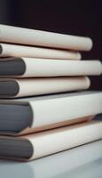 stack of books sitting on top of a table photo