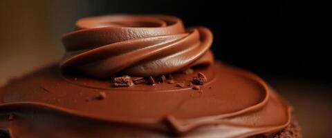 close up of a chocolate cupcake with chocolate frosting photo