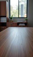 wooden table in front of a window photo