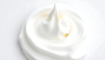close up of a whipped cream on a white surface photo