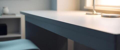 desk with a lamp on top of it next to a window photo