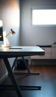 desk with a lamp on top of it photo