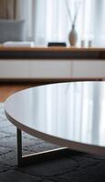 close up of a coffee table with a vase in the background photo