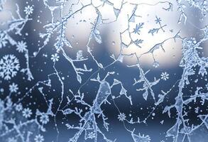 close up of a frosted window with a blurry background photo