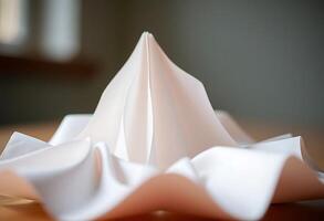 close up of a folded paper object photo