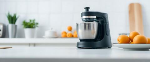 blender sitting on top of a counter next to oranges photo