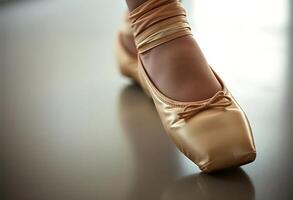 close up of a ballerina's shoes on a table photo