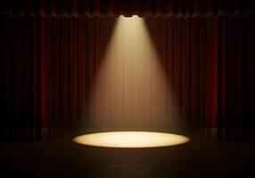 A stage with a spotlight shining on a red curtain photo