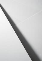 A white wall with a shadow on it photo