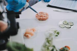 A person in a lab coat is holding a knife and cutting vegetables photo