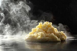 Soft and indulgent dish of mashed potatoes with crispy butter and thyme photo