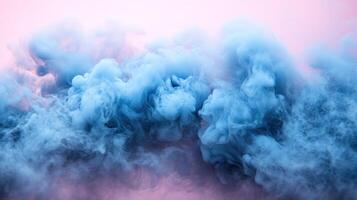 Blue smoke on a pink background photo