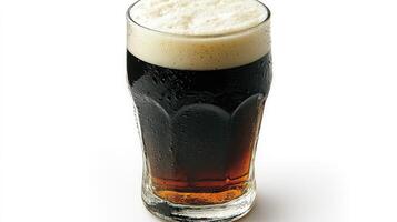 A tall glass of dark beer on a white background photo