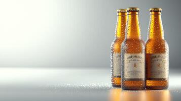 Three beer bottles with water drops on a table photo