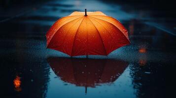 A red umbrella in the rain photo