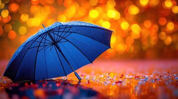 A blue umbrella sitting in the rain photo