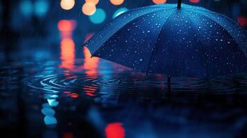 A blue umbrella in the rain photo