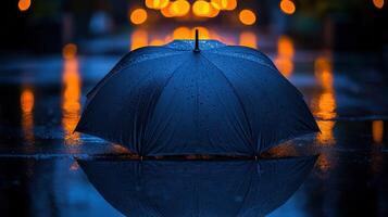 A black umbrella on the ground photo