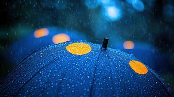 A blue umbrella with yellow dots photo