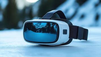 A pair of virtual reality goggles on a snowy surface photo