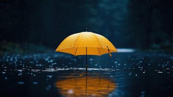 A yellow umbrella is standing in the water photo